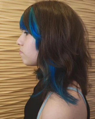 A beautiful refresh and cut for a guest by our stylist Jenna @hair_byjennag
We love the blue highlight made vibrant with @aveda color. 

If you had a choice, what vibrant hair color would you do to your hair? Would you want a small section or full color transformation? At Mark Pardo, we have two separate locations and multiple stylists who would be more than willing to help you reach your hair goal. Schedule an appointment by calling us at 505-298-2983.